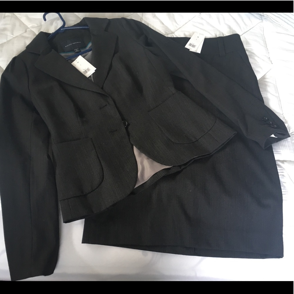 Perfect Banana Republic Black pinstripe suit.